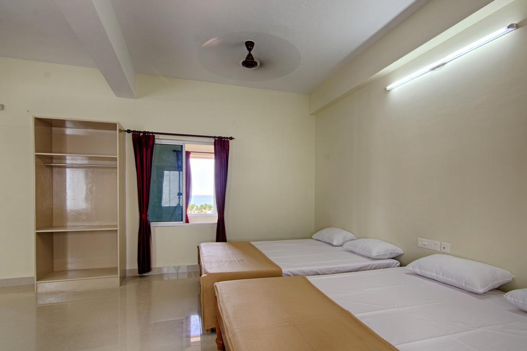 Hotel Ganesh Residency Puduččéri Pokoj fotografie