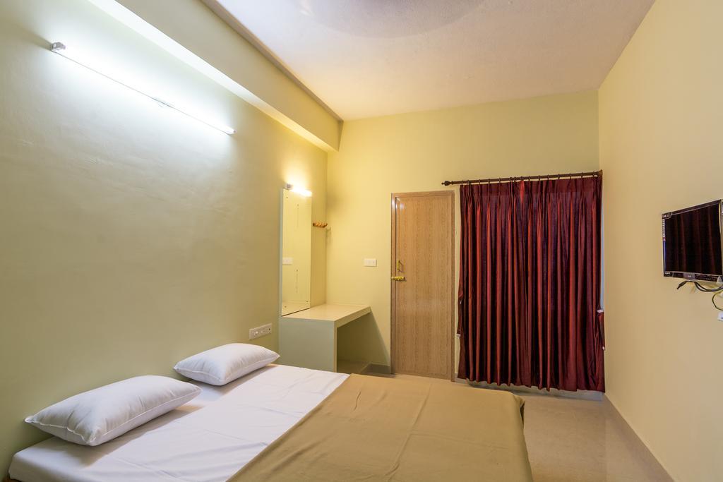 Hotel Ganesh Residency Puduččéri Pokoj fotografie